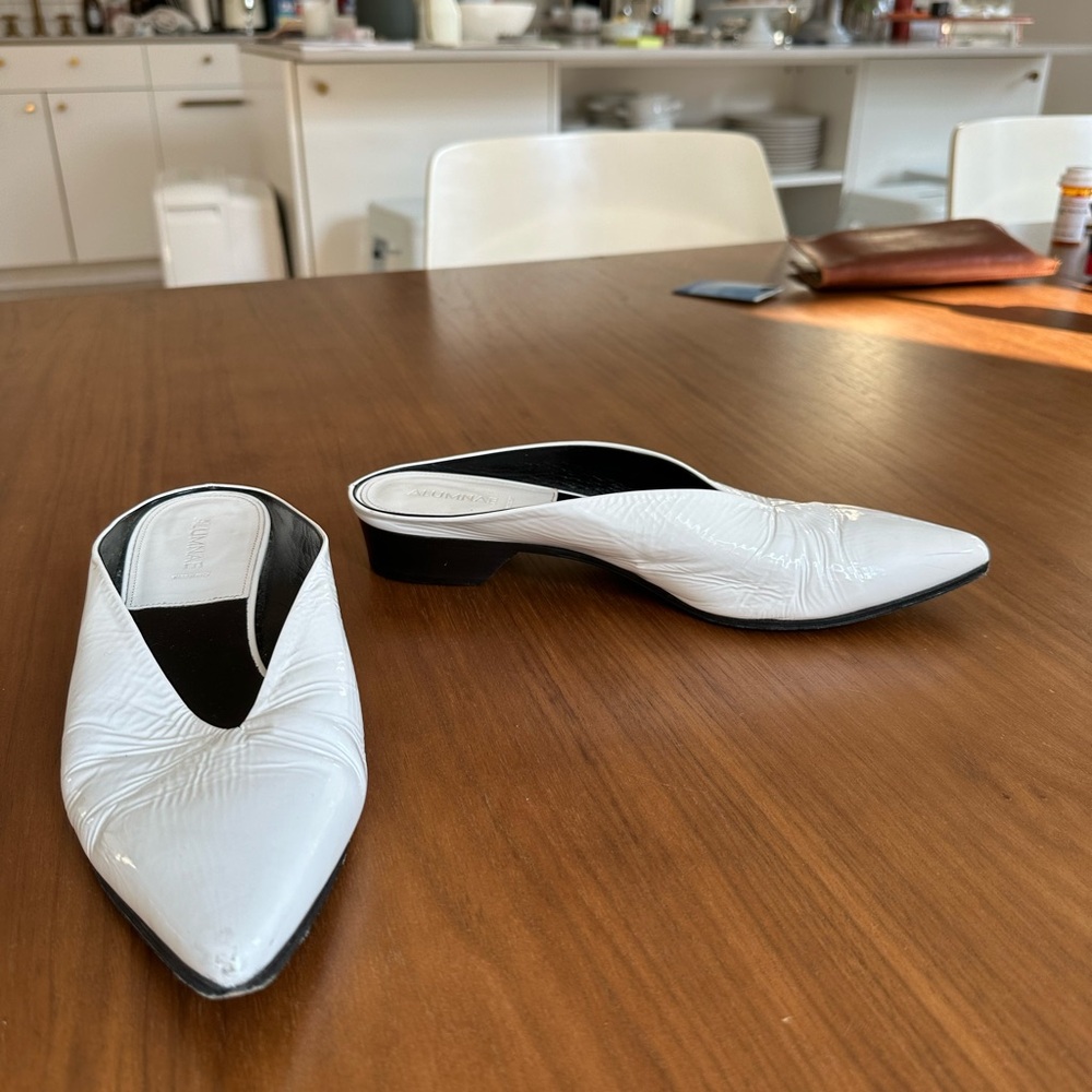 Hard to find ALMUNAE white patent mules